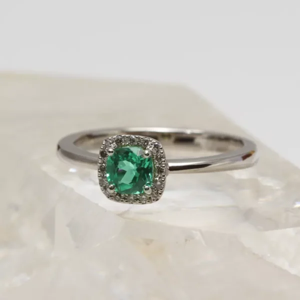 The Invergeldie: Recycled 950 Platinum Emerald and Diamond Halo Engagement Ring