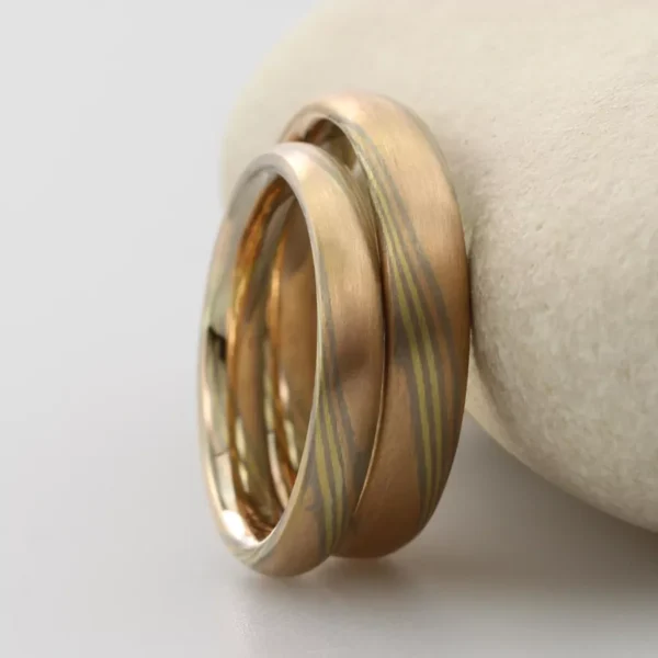 The Hayakawas: Rose Gold Mokume Gane Wedding Ring with White Gold and Yellow Gold