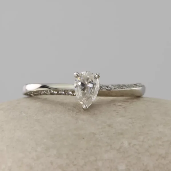 The Tywi: Handmade 950 Platinum Pear Cut Solitaire Engagement Ring with Pave Set Shoulders