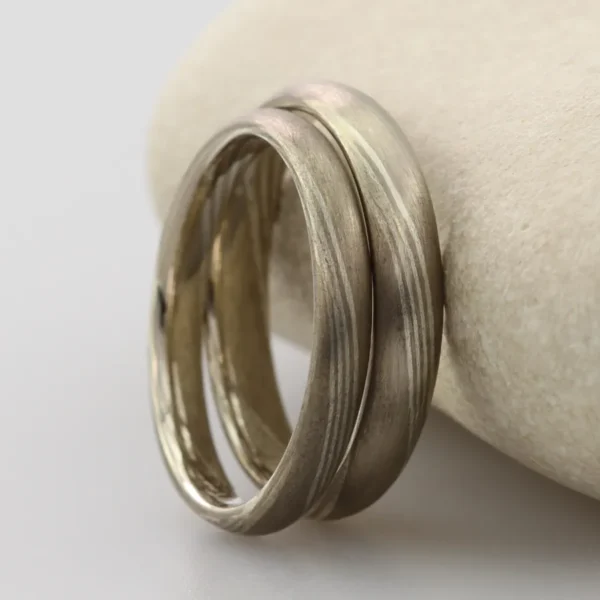 The Hayakawas: 18ct White Gold Mokume Gane Wedding Rings with Silver