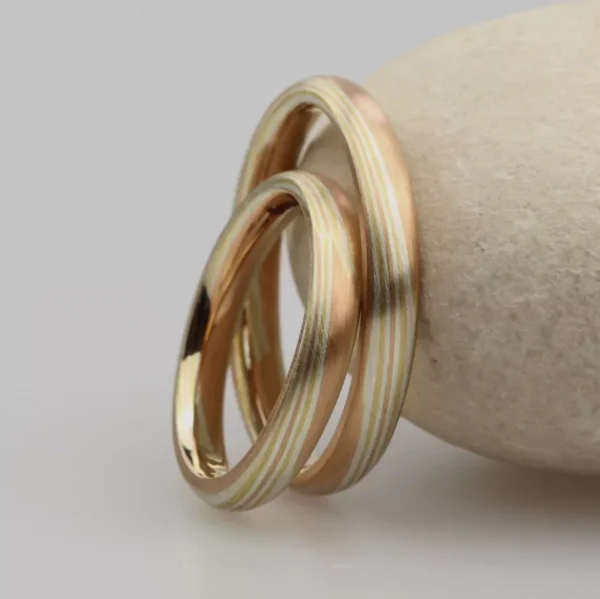 The Hayakawas: Rose Gold Mokume Gane Wedding Ring with Yellow Gold and Silver