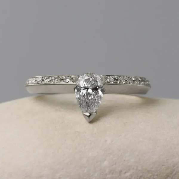 The Leacann: 950 Platinum Pear Cut Diamond or Moissanite Engagement Ring with Pave Set Shoulders