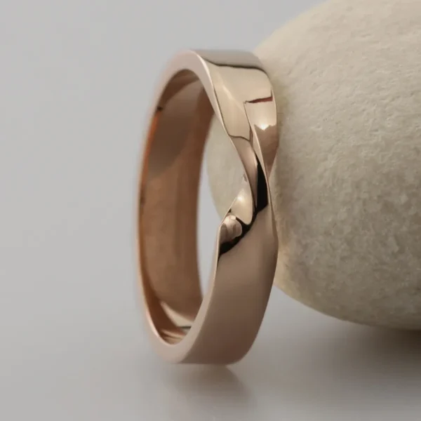 The Laggan: Ethical 18ct Rose Gold Wedding Ring with single twist