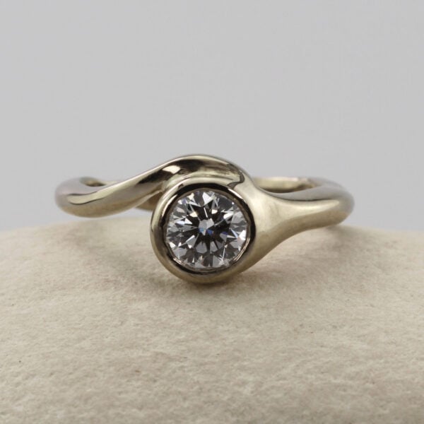 The Swift: Recycled 14ct White Gold Twist Crossover Solitaire Diamond Engagement Ring