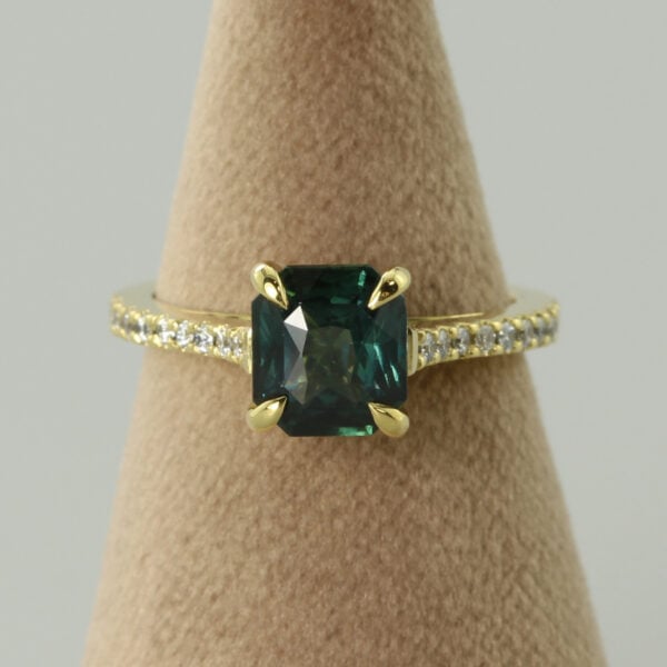 The Doe: 18ct Gold Teal Emerald Cut Sapphire and Diamond Engagement Ring