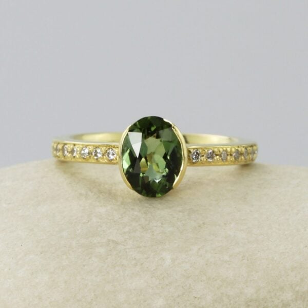 The Burntollet: 18ct Gold Partial Collet Oval Tourmaline Engagement Ring with Pavé Set Diamond Shoulders