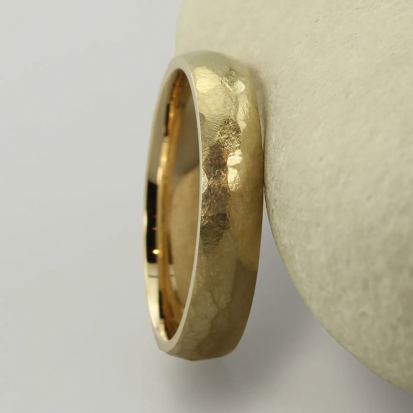 Eco Friendly 9ct gold hammered wedding ring ready to wear