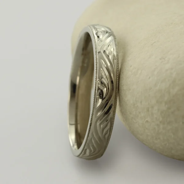 The Medway: Hand Engraved Rolling Waves 950 Platinum Ring with Milgrain Edge